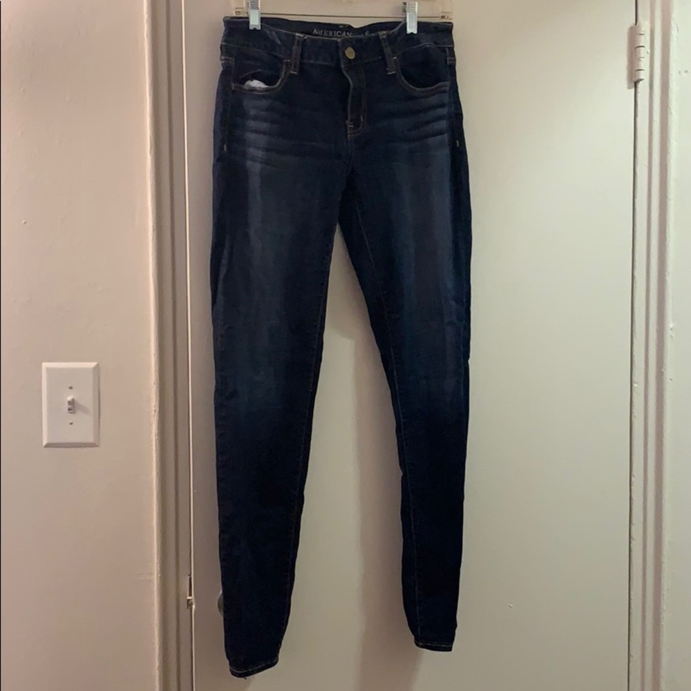 Dark blue distressed stretchy skinny jeans